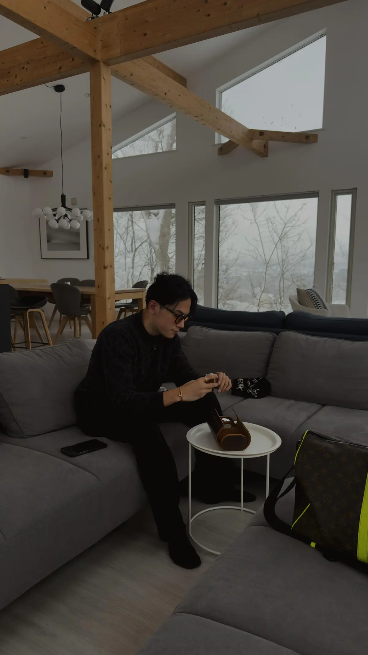 Vatana Pang relaxing in a chalet living room